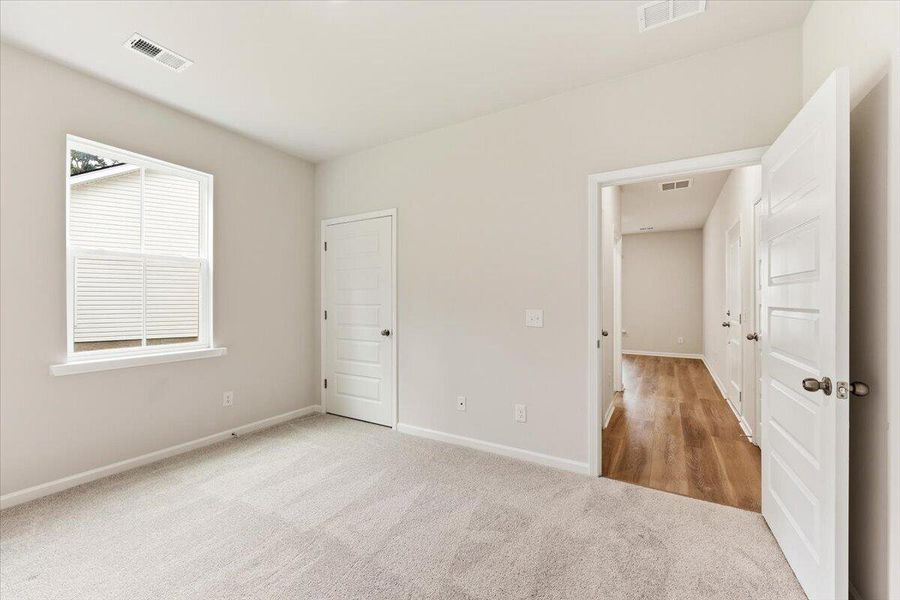 Spacious, unfurnished interior of a new home in Limehouse Village: Arbor Series, Summerville (Image 52).