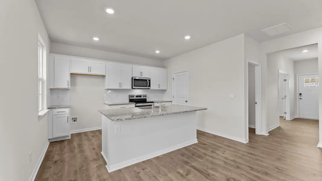 Furnished interior view inside a new home in Ridgewood Farms, Winterville (Image 5).