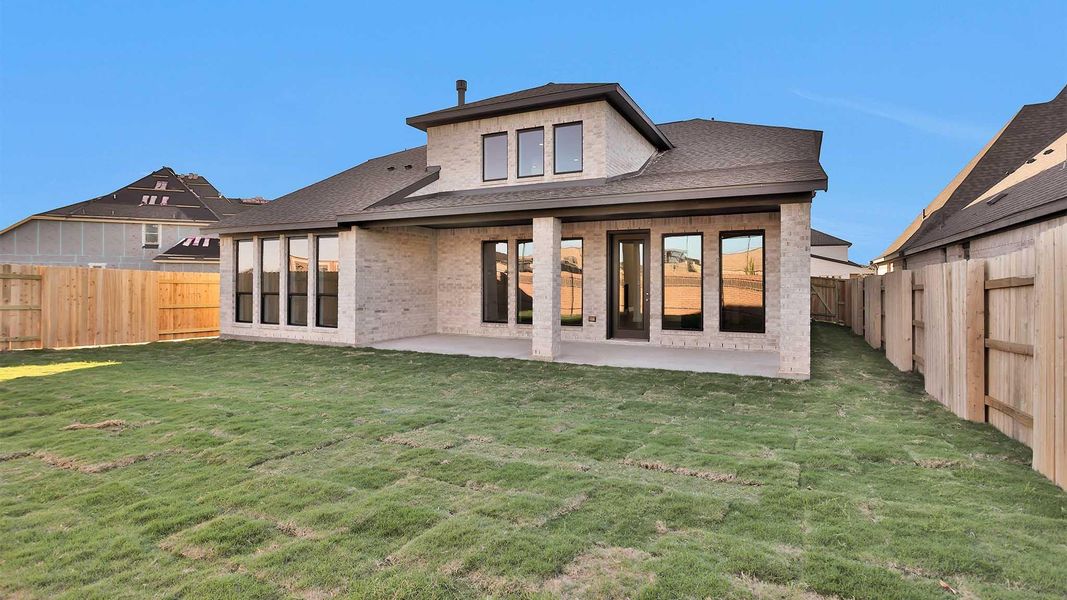 Exterior details and patio area of a home in Elyson 55', Katy (Image 4). Exterior details and patio area of a home in Elyson 55', Katy (Image 4).