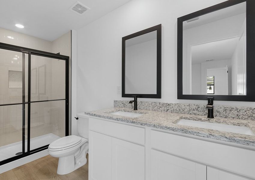 Get ready for your day in the master bathroom