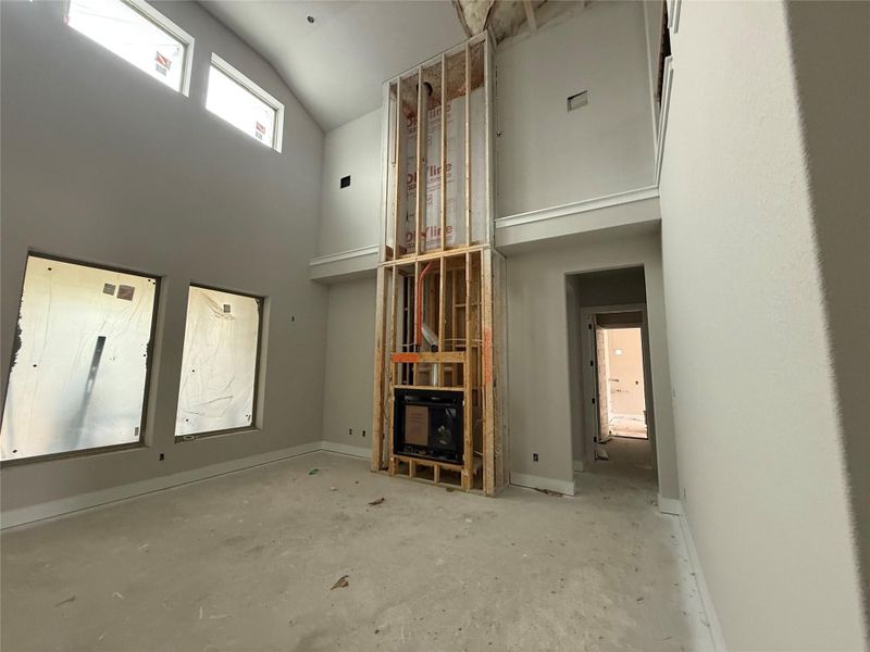 Family Room with Soaring Ceilings and Fireplace