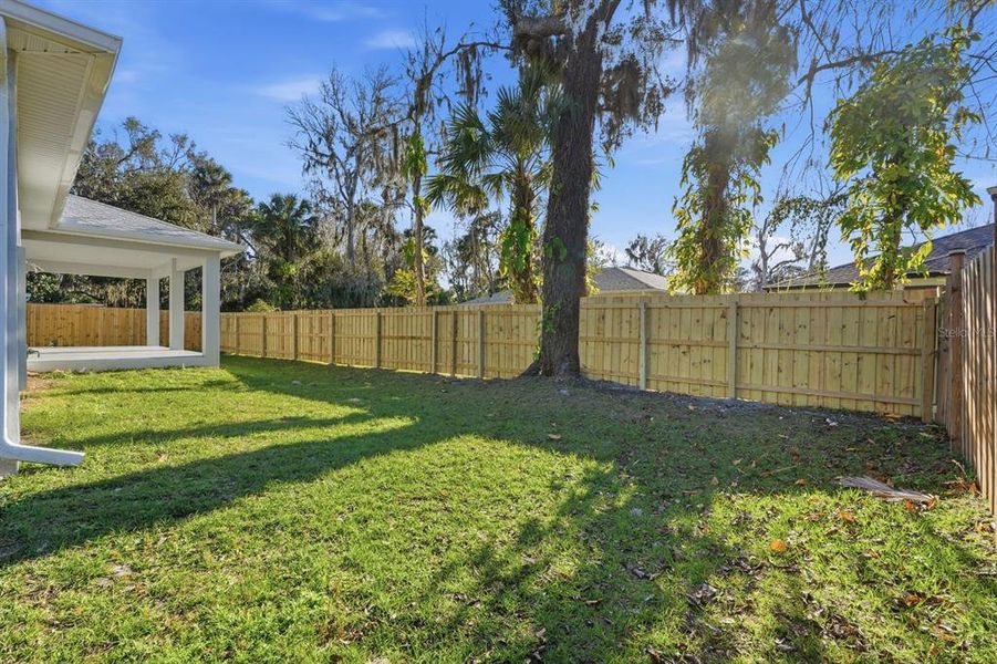 Exterior details and patio area of a home in , New Smyrna Beach (Image 30).