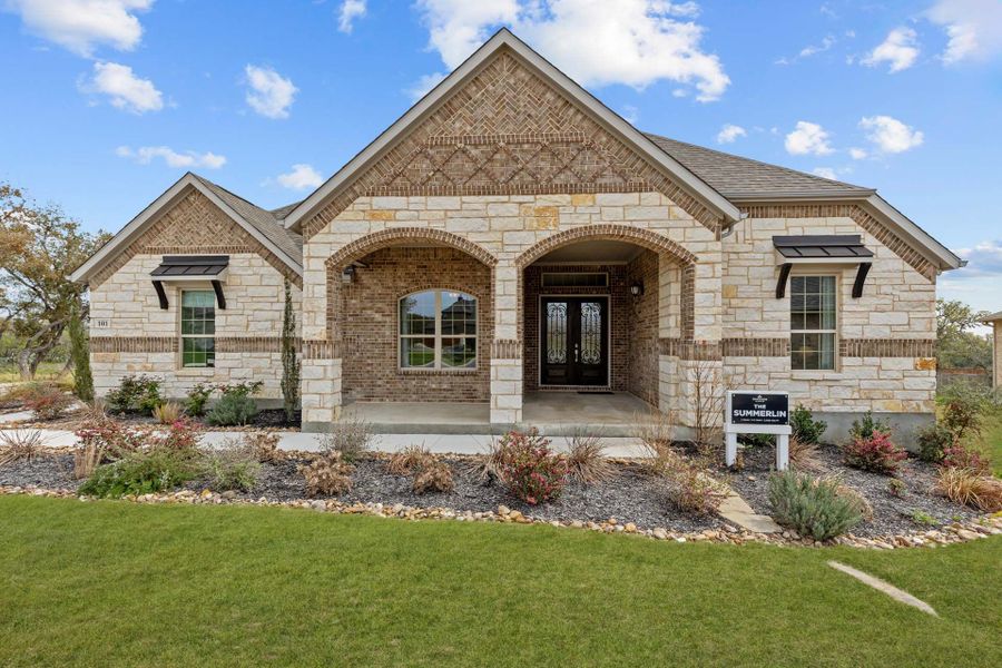 Representative exterior photo of a completed home built from the The Summerlin A by Davidson Homes LLC in Potranco Oaks, Castroville, TX (Image 22).