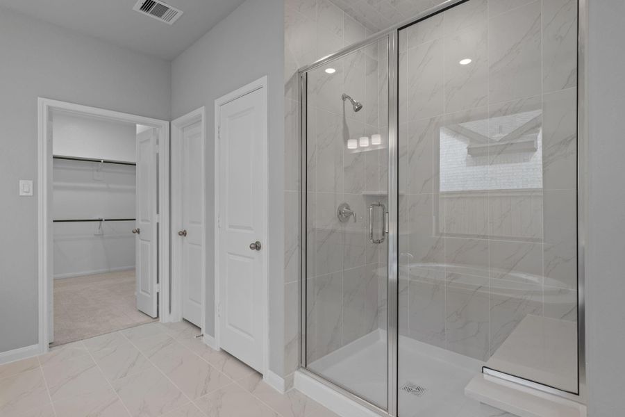 Furnished interior view inside a new home in Bridgeland 55', Cypress (Image 10).