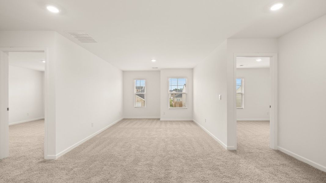 Representative unfurnished interior of a home built from the Hanover by D.R. Horton in The Reserve at Calcutta, Stockbridge (Image 18).