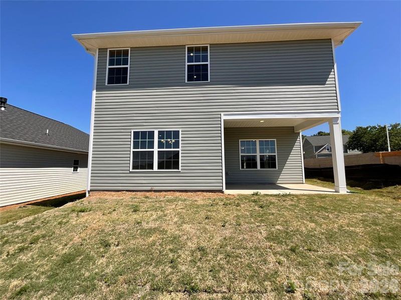 Exterior details and patio area of a home in Village at Parkside, Gastonia (Image 4).