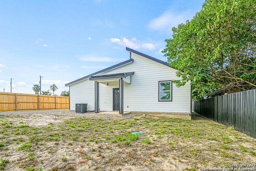 Front exterior of a new home in , Von Ormy, TX, highlighting curb appeal (Image 15). Front exterior of a new home in , Von Ormy, TX, highlighting curb appeal (Image 15).