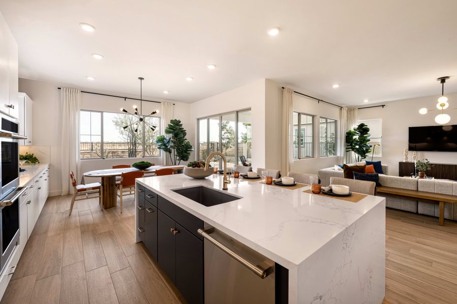 Representative furnished interior of a home built from the Tipton Plan 3507 by Tri Pointe Homes in Waterston Central, Gilbert (Image 7).
