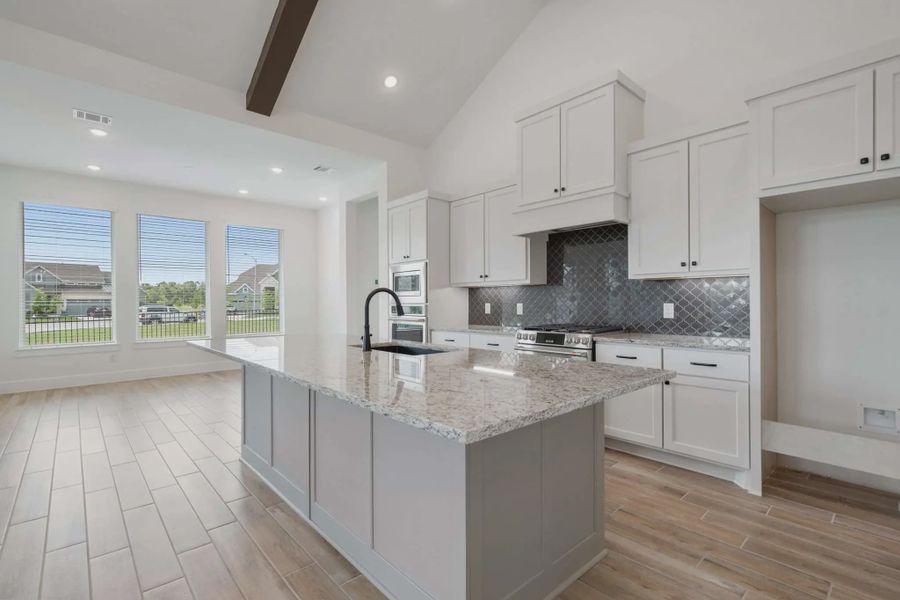 Representative furnished interior of a home built from the Malibu by Chesmar Homes in Fulshear Lakes, Fulshear (Image 7).