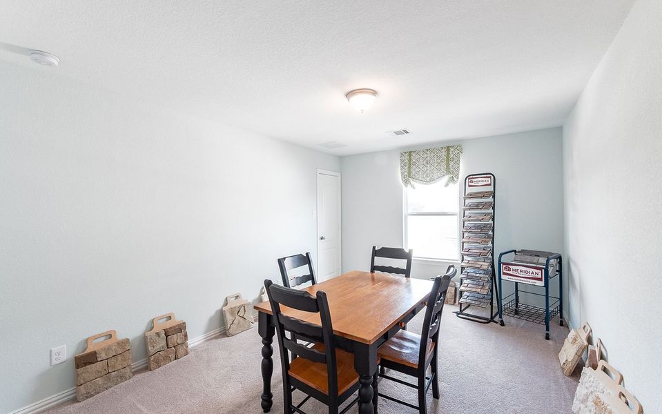 Representative furnished interior of a home built from the Snowmass by CastleRock Communities in Sanctuary, Salado (Image 15).
