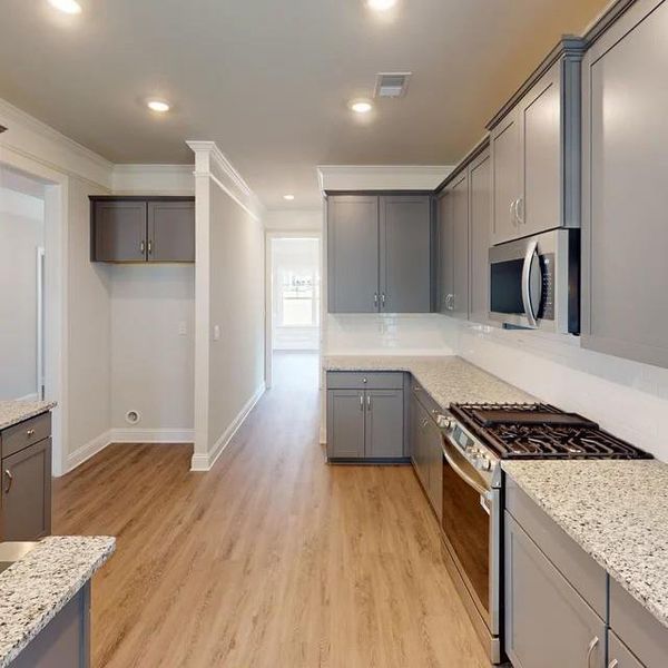 Furnished interior view inside a new home in Mirror Lake at South Harbour, Villa Rica (Image 6).