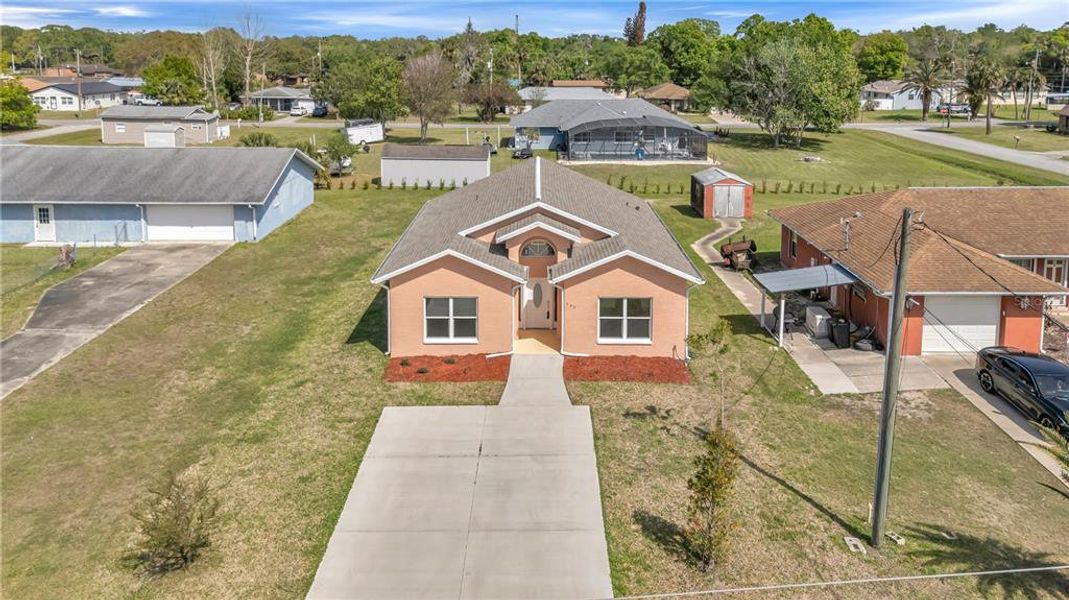 Front exterior of a new home in , New Smyrna Beach, FL, highlighting curb appeal (Image 18). Front exterior of a new home in , New Smyrna Beach, FL, highlighting curb appeal (Image 18).