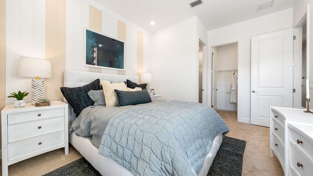 Furnished interior view inside a new home in Esplanade by the Islands, Naples (Image 14).