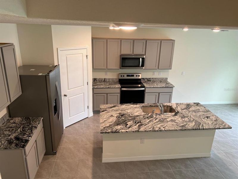 Furnished interior view inside a new home in Epperson, Wesley Chapel (Image 7).