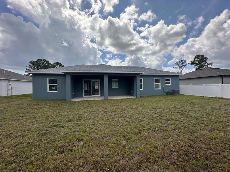 Front exterior of a new home in , Palm Bay, FL, highlighting curb appeal (Image 30). Front exterior of a new home in , Palm Bay, FL, highlighting curb appeal (Image 30).