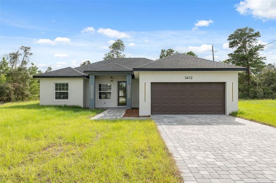 Front exterior of a new home in , Ocala, FL, highlighting curb appeal (Image 19).