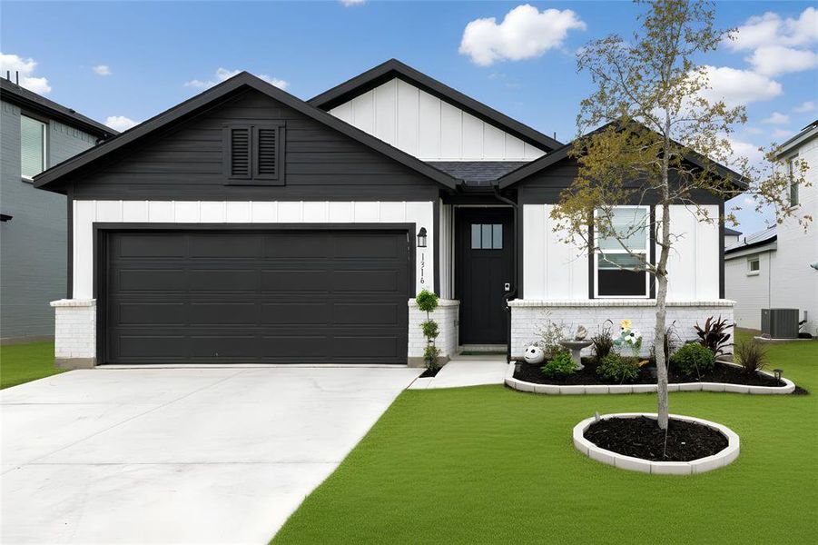 Front exterior of a new home in , Fort Worth, TX, highlighting curb appeal (Image 27). Front exterior of a new home in , Fort Worth, TX, highlighting curb appeal (Image 27).