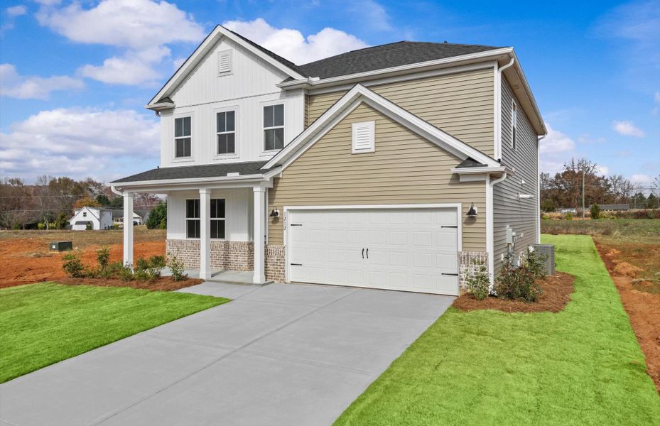 Front exterior of a new home in Fox Hollow, Spartanburg, SC, highlighting curb appeal (Image 18). Front exterior of a new home in Fox Hollow, Spartanburg, SC, highlighting curb appeal (Image 18).
