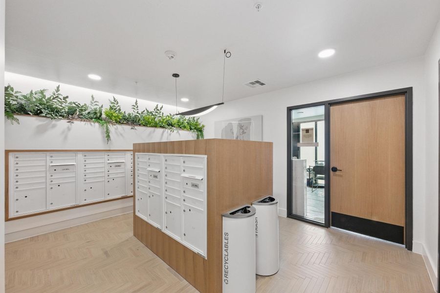 Secure, organized mailboxes and sleek flooring welcome residents and guests.