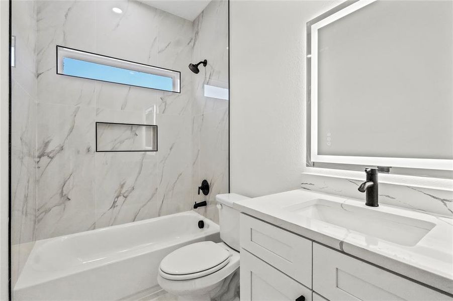 Full bath with shower / tub combination and vanity Full bath with shower / tub combination and vanity