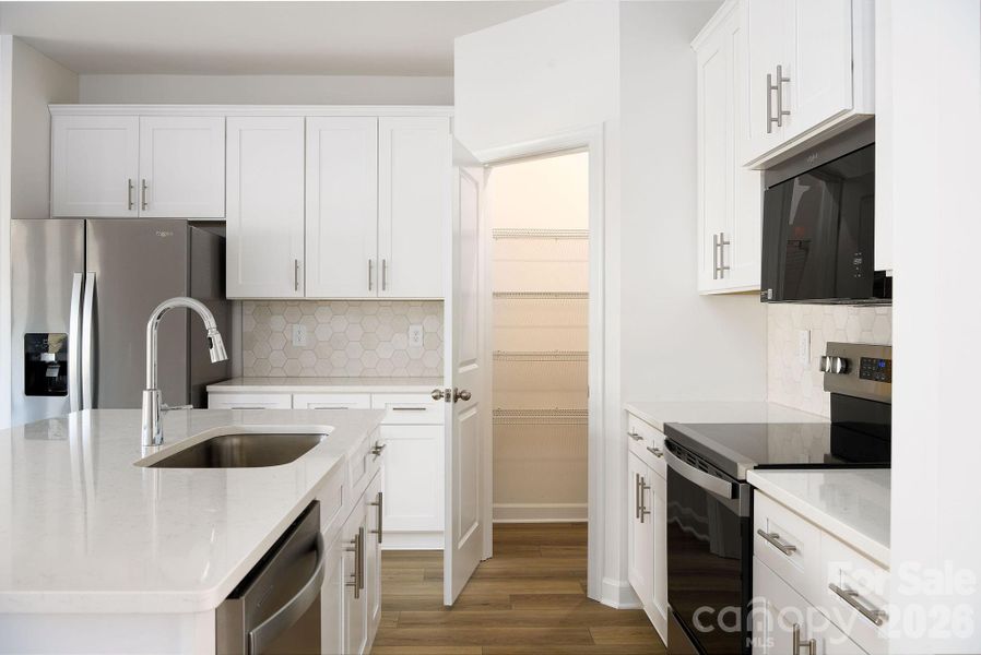 Furnished interior view inside a new home in , Mocksville (Image 15).
