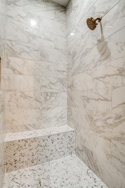 Bathroom with a tile shower