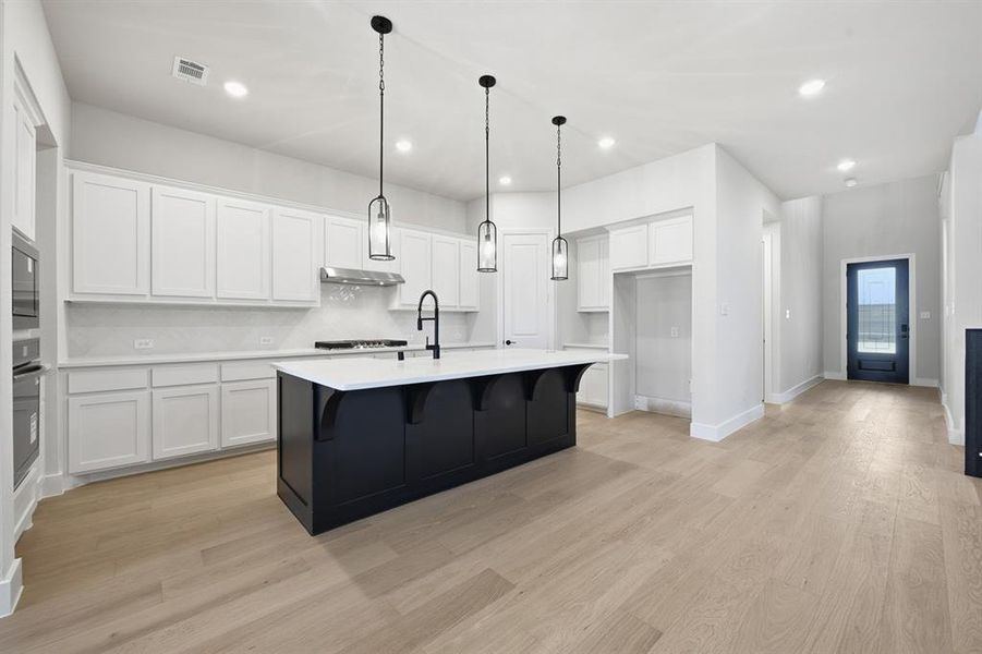 Furnished interior view inside a new home in Wildridge, Oak Point (Image 9).