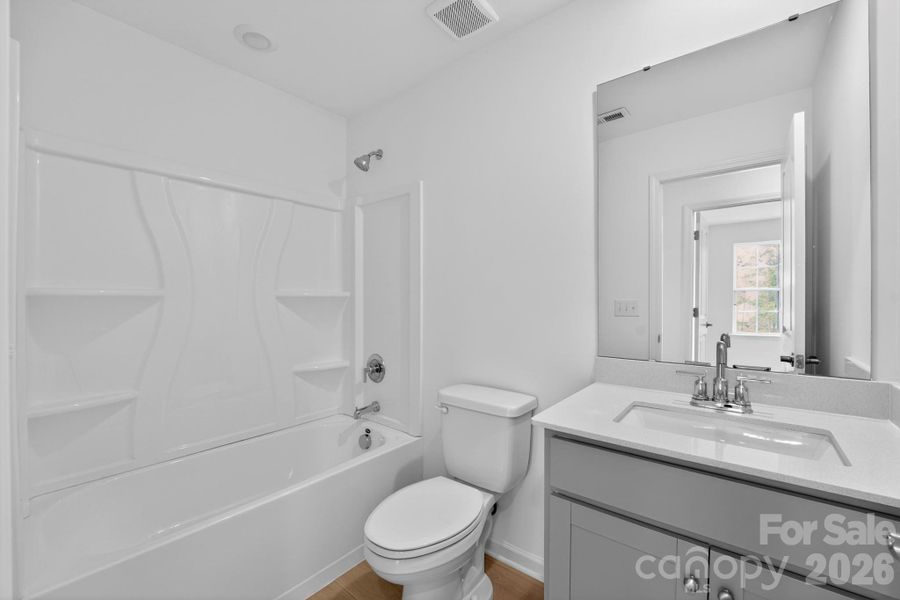 Furnished interior view inside a new home in Village of Waxhaw, Waxhaw (Image 3).