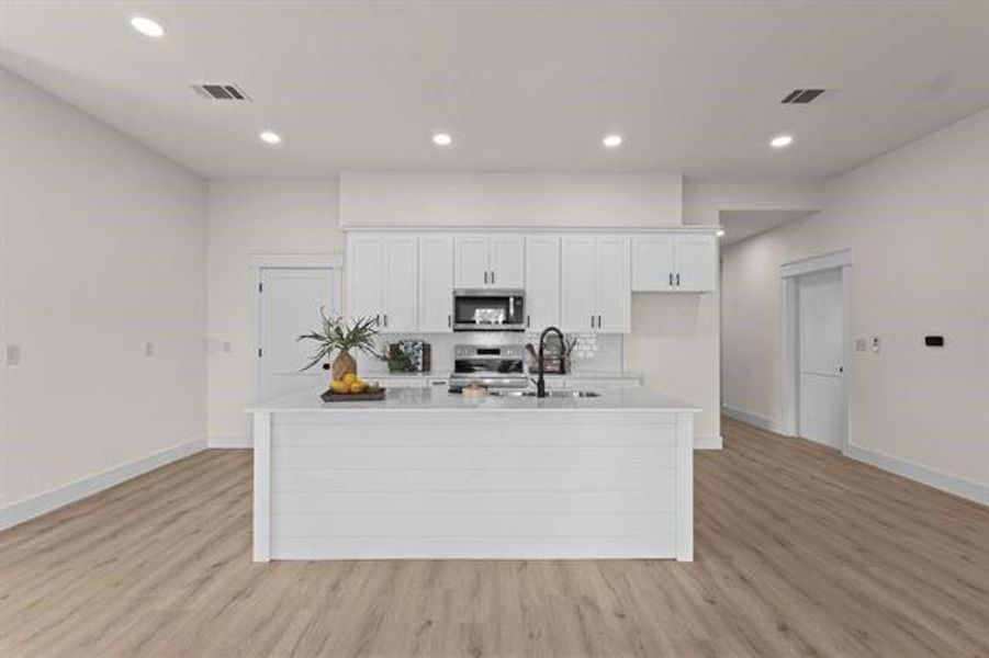 Furnished interior view inside a new home in , Orange (Image 10). Furnished interior view inside a new home in , Orange (Image 10).