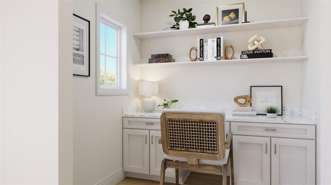 Home office with hardwood / wood-style flooring and a wealth of natural light