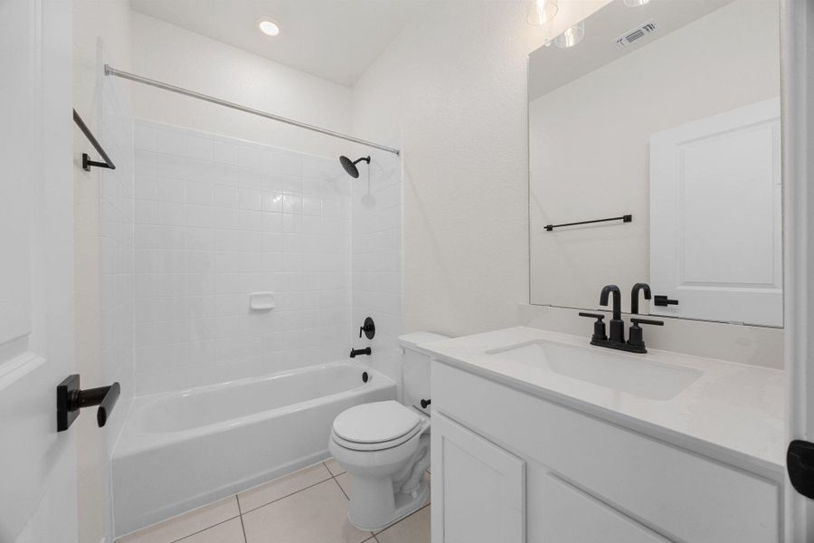 Furnished interior view inside a new home in Mustang Valley, Manor (Image 10).