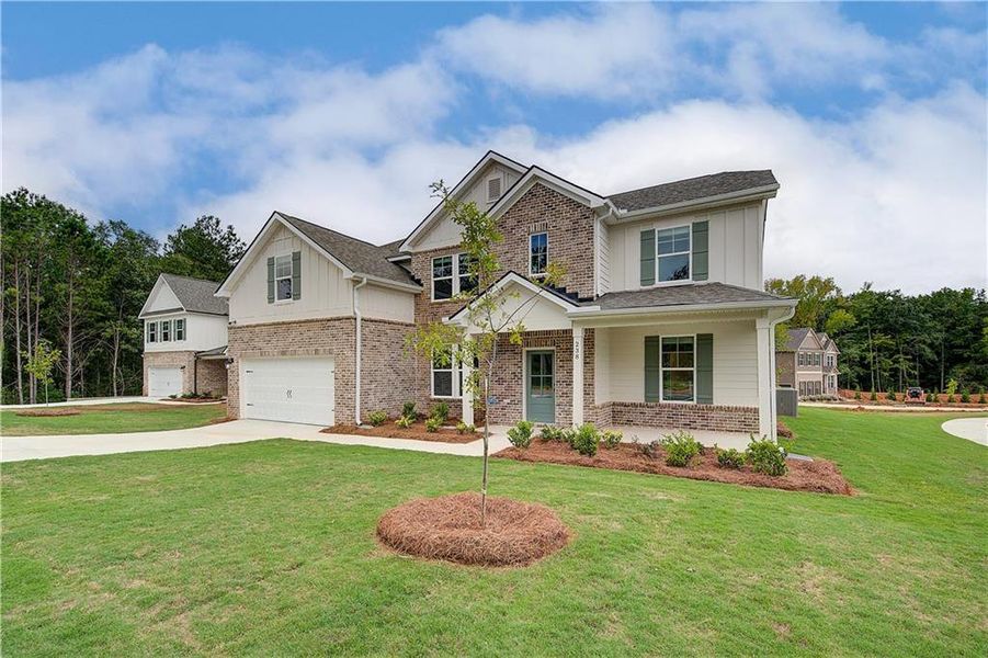 Front exterior of a new home in Kingston, Locust Grove, GA, highlighting curb appeal (Image 24).