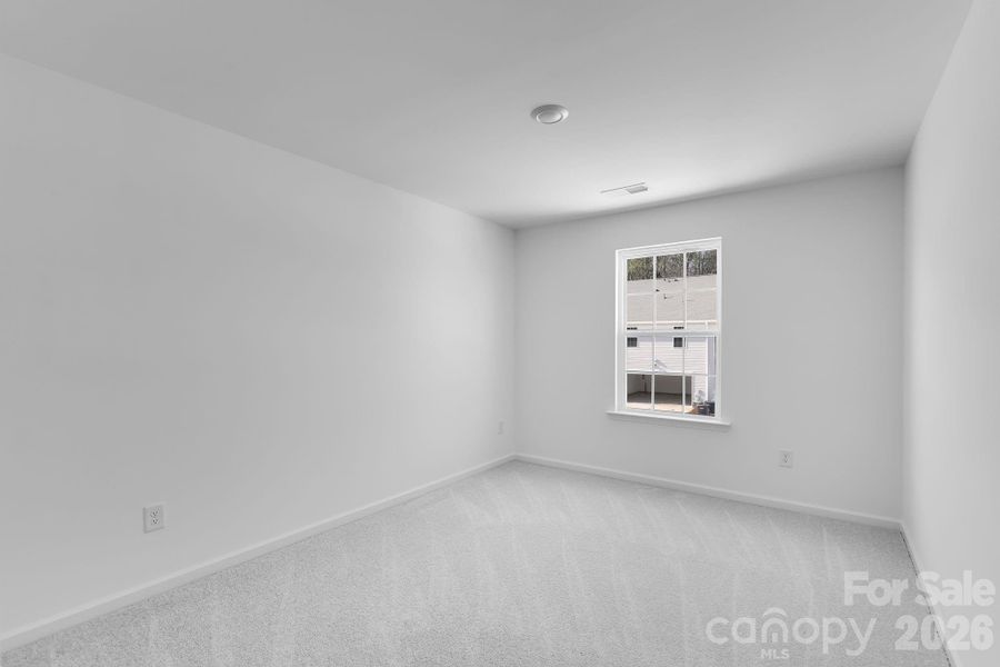 Spacious, unfurnished interior of a new home in Cannon Village, York (Image 11).