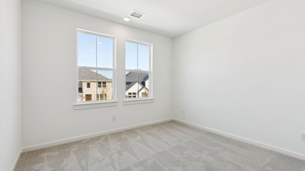 Representative unfurnished interior of a home built from the Tristan by Normandy Homes in Rainwater Crossing, Celina (Image 13).
