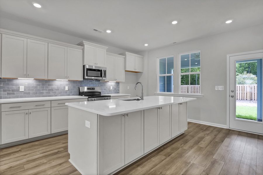 Furnished interior view inside a new home in Grand Park, Leland (Image 5). Furnished interior view inside a new home in Grand Park, Leland (Image 5).