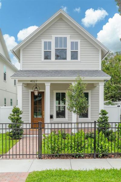 Front exterior of a new home in , St. Petersburg, FL, highlighting curb appeal (Image 24).