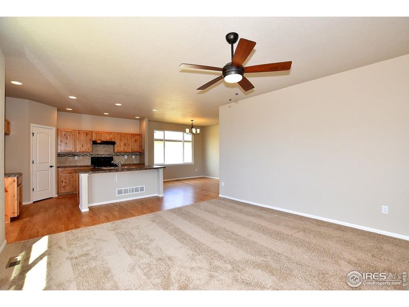 Spacious, unfurnished interior of a new home in Union Colony West, Greeley (Image 24).