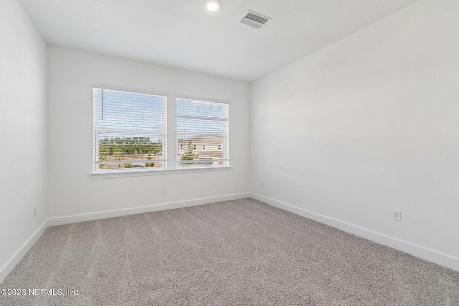 Spacious, unfurnished interior of a new home in Westerly Park at Wildlight – Overlook Collection, Yulee (Image 28).