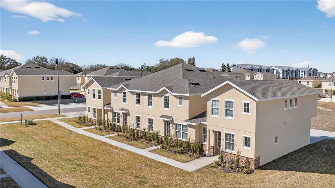 Front exterior of a new home in , Davenport, FL, highlighting curb appeal (Image 22).