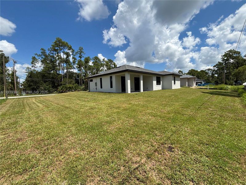 Exterior details and patio area of a home in , Lehigh Acres (Image 31).
