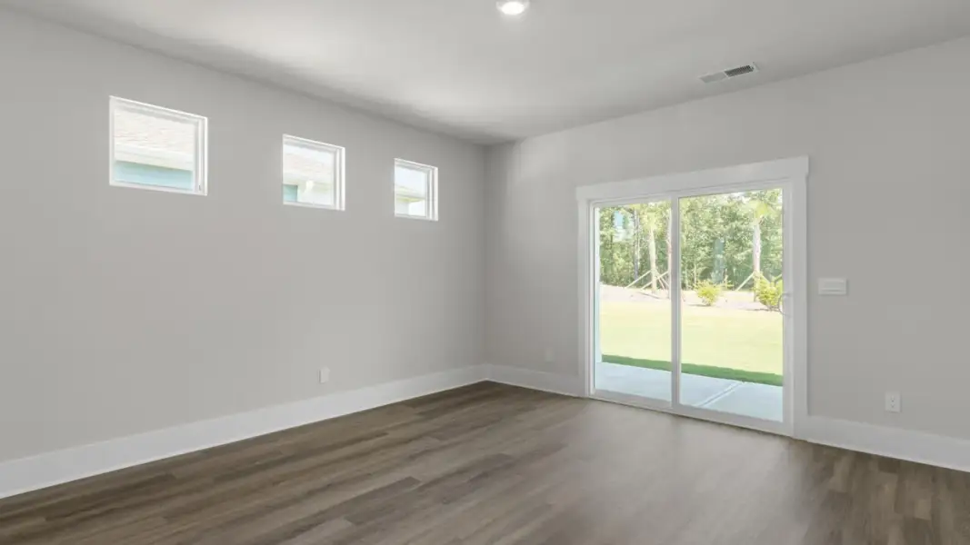 Spacious, unfurnished interior of a new home in The Retreat at Indigo Preserve Townhomes, Leland (Image 14).
