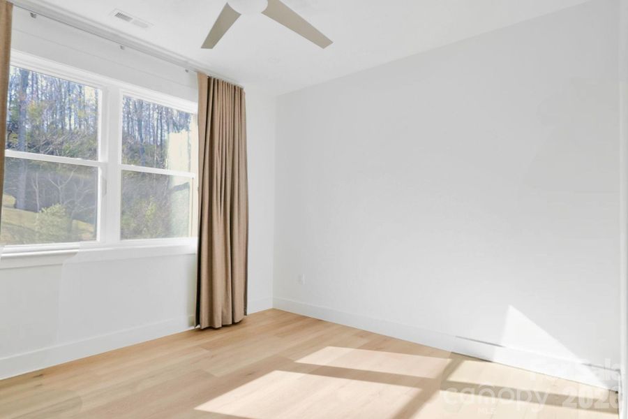 Spacious, unfurnished interior of a new home in , Hendersonville (Image 18).