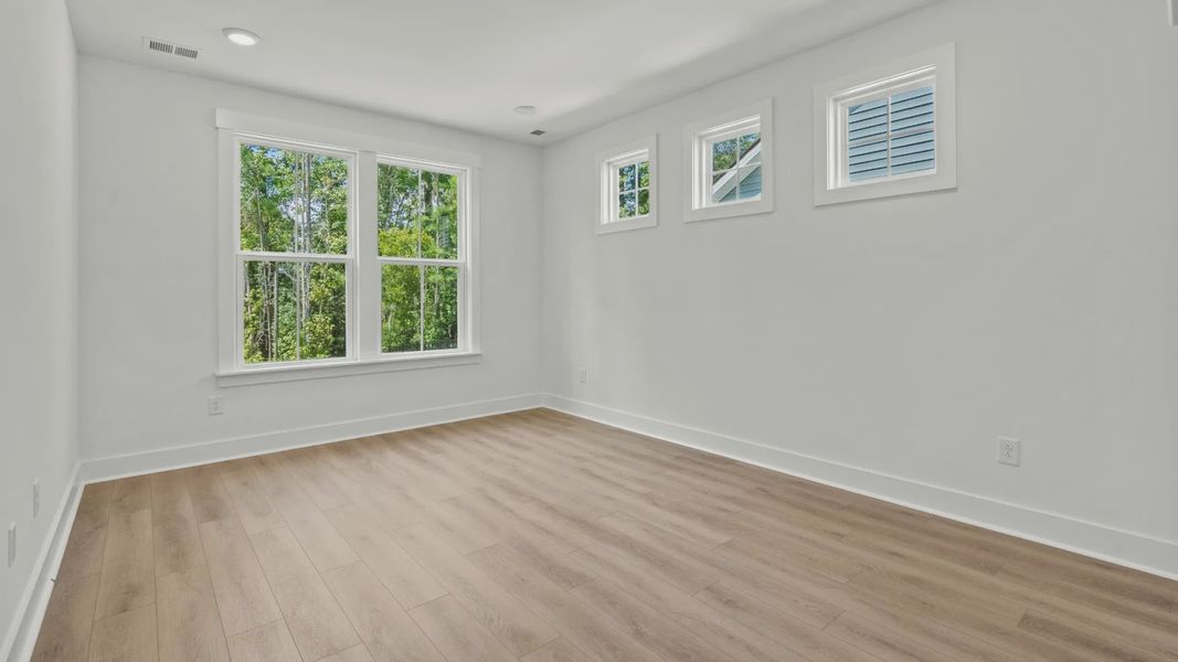 Furnished interior view inside a new home in Bluffs at Sun Colony, Longs (Image 14).