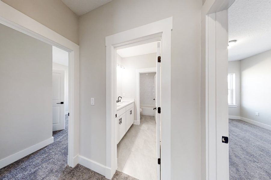 Representative unfurnished interior of a home built from the Julington by Riverside Homes in Hidden Creek at SilverLeaf 70' Series, St. Augustine (Image 15).