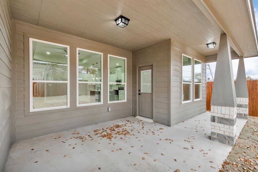 Entrance to property with a patio area