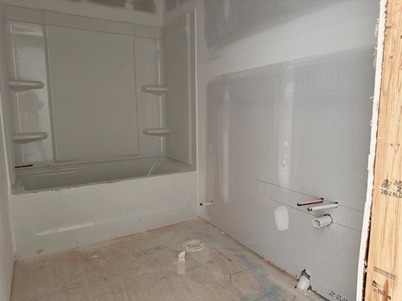 Bath 2 featuring the AW Collection® Coastal - Bright with white cabinets and quartz countertops.