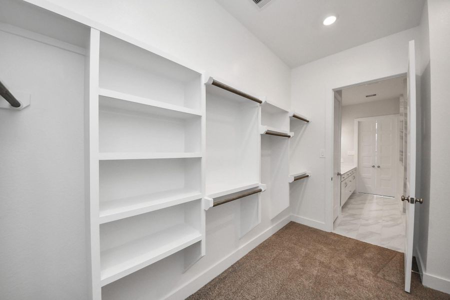 Furnished interior view inside a new home in Elyson, Katy (Image 30).