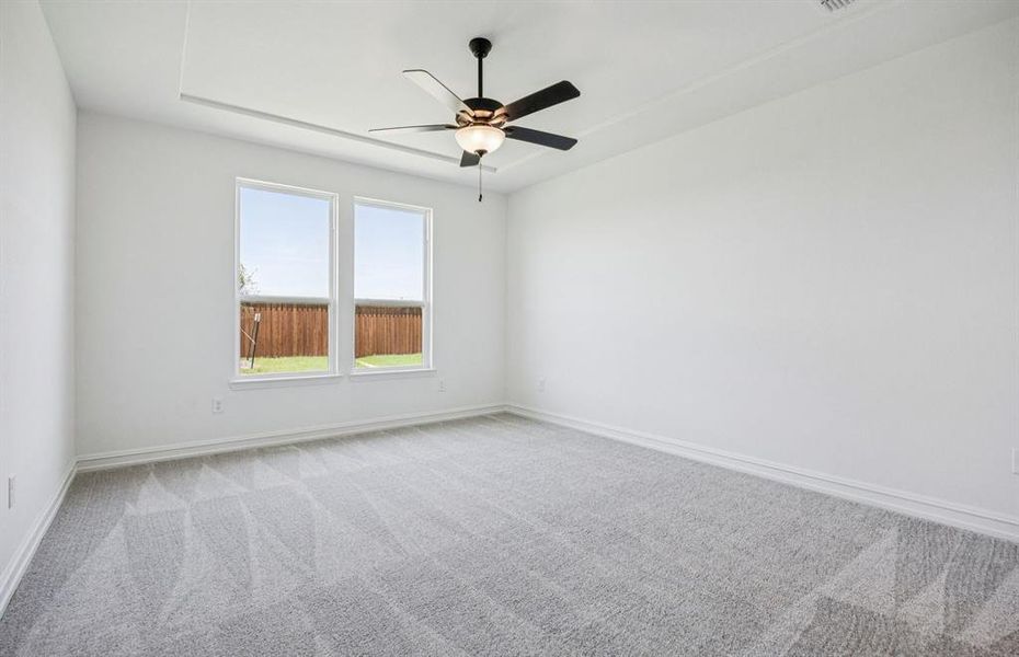 Spacious owner's suite with large windows Spacious owner's suite with large windows