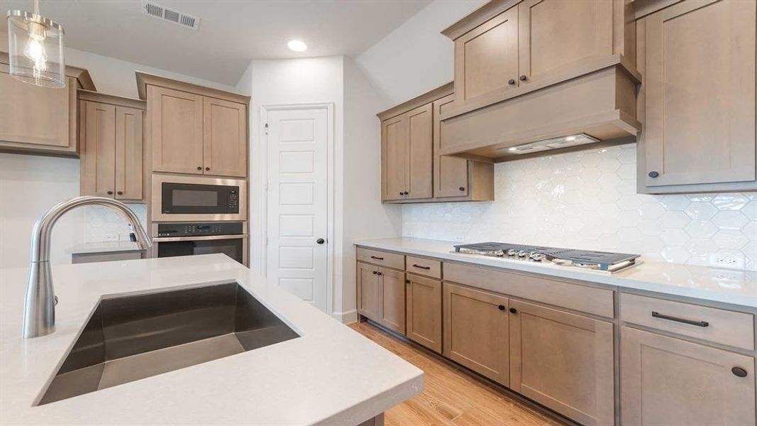 Furnished interior view inside a new home in The Heights At Uptown Celina 45', Celina (Image 9). Furnished interior view inside a new home in The Heights At Uptown Celina 45', Celina (Image 9).