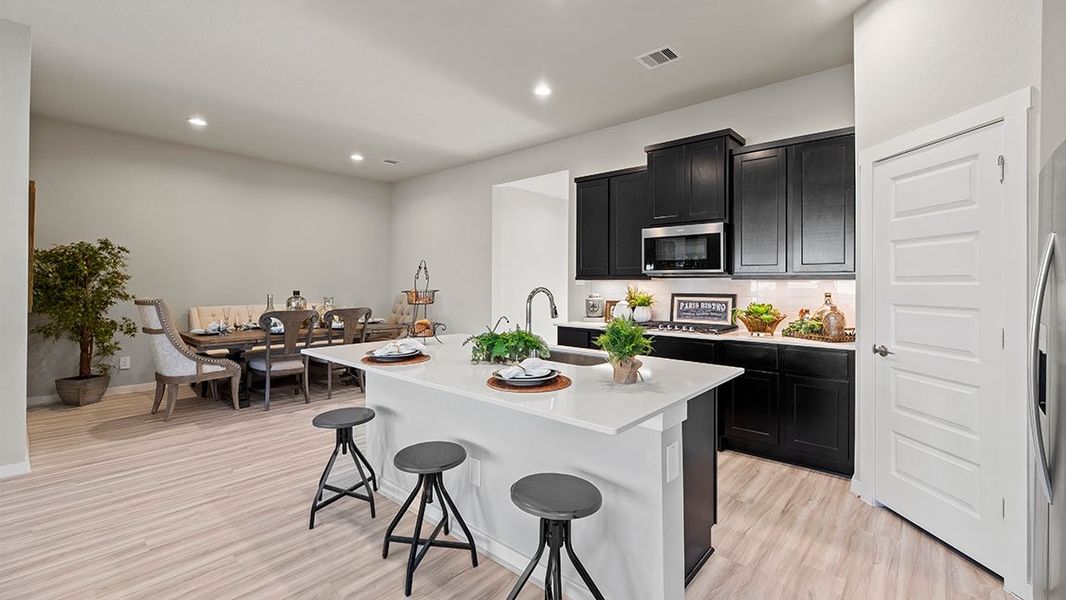 Representative furnished interior of a home built from the Lorenzo by D.R. Horton in Davis Harbor, League City (Image 6).